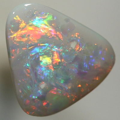 SOLID SEMI BLACK OPAL Swirls of red and orange contrasted by blue and green. With VIDEO